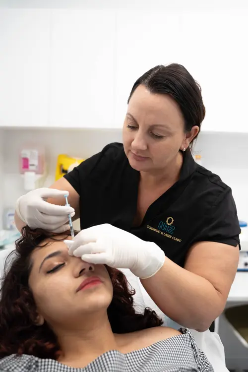 Nurse Mellisa administering injections for Nisla Rahim at NiZ Clinic, Gold coast - Australia